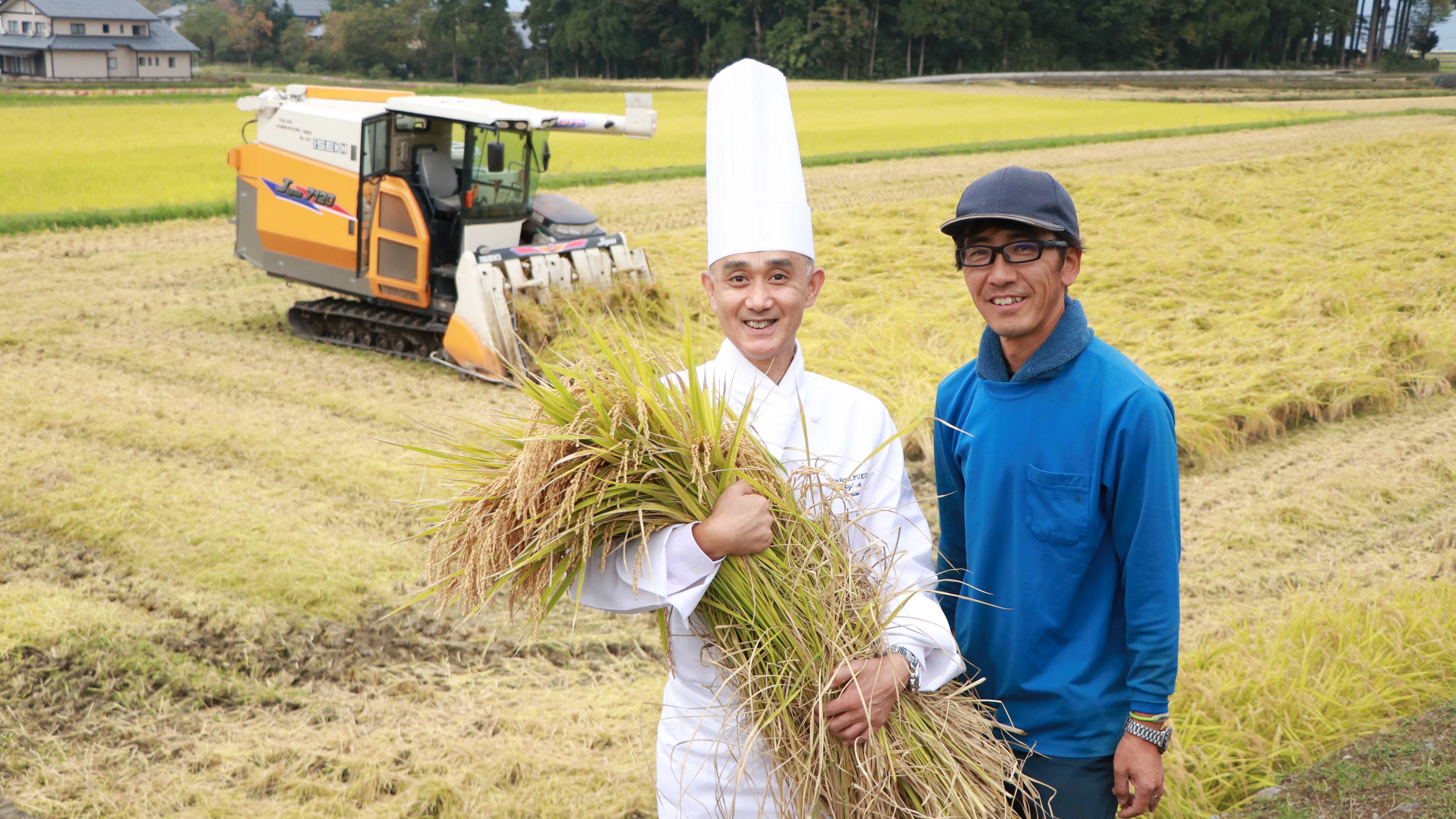 朝食のお米を生産する、帰山さんと総料理長