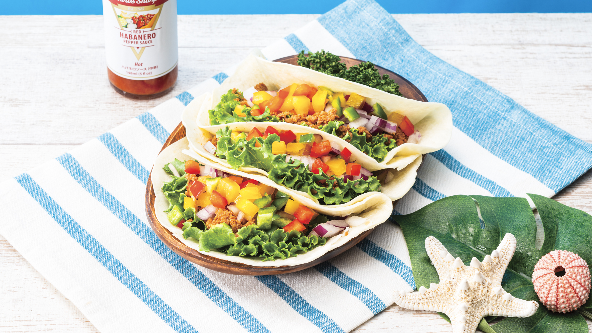 アメリカと沖縄の文化が融合した、彩り豊かな具材を包む朝にぴったりのタコス