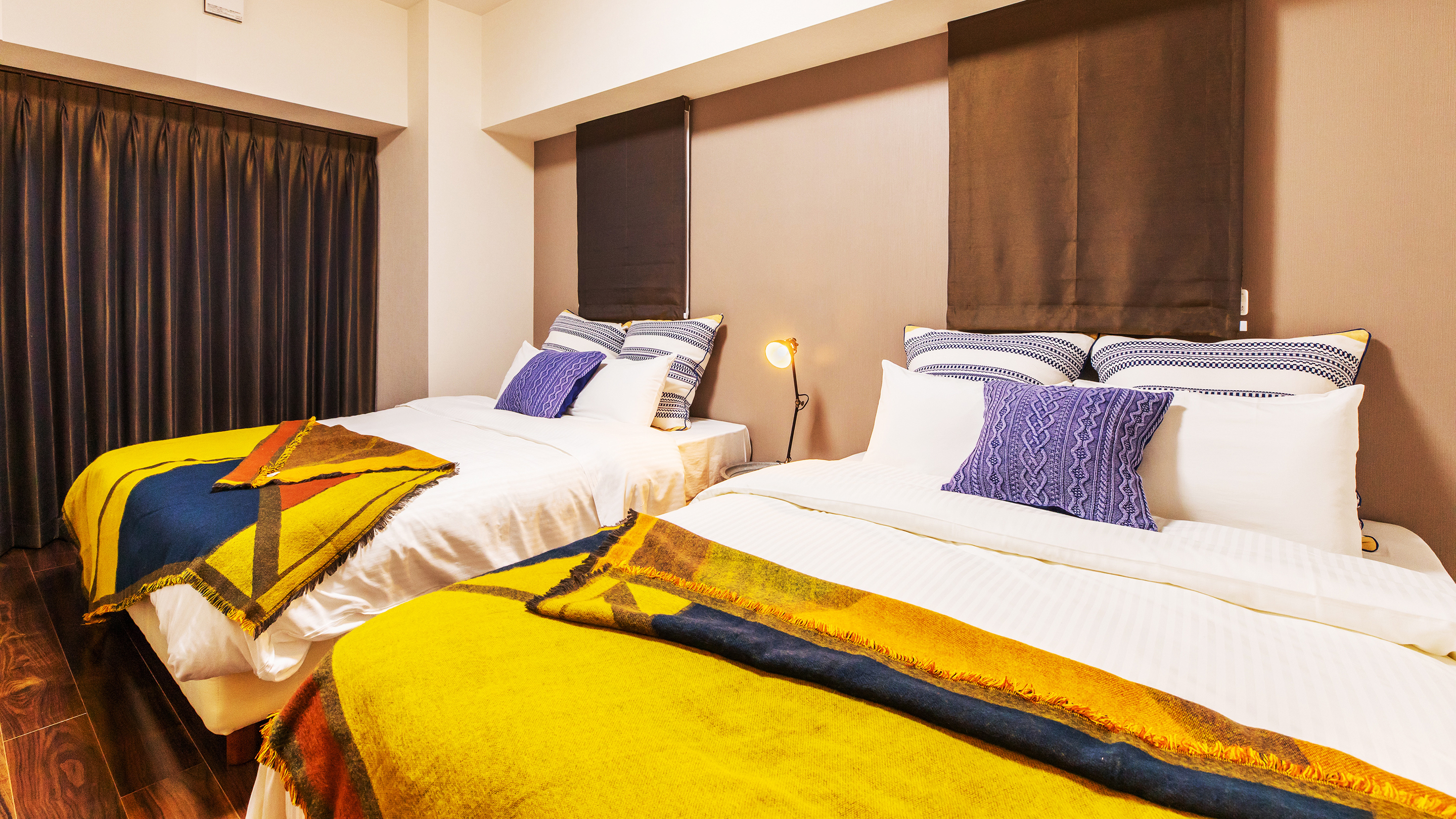 【6F】ベッドルーム　アジアのリゾート地を彷彿させる明るいベッドルーム。