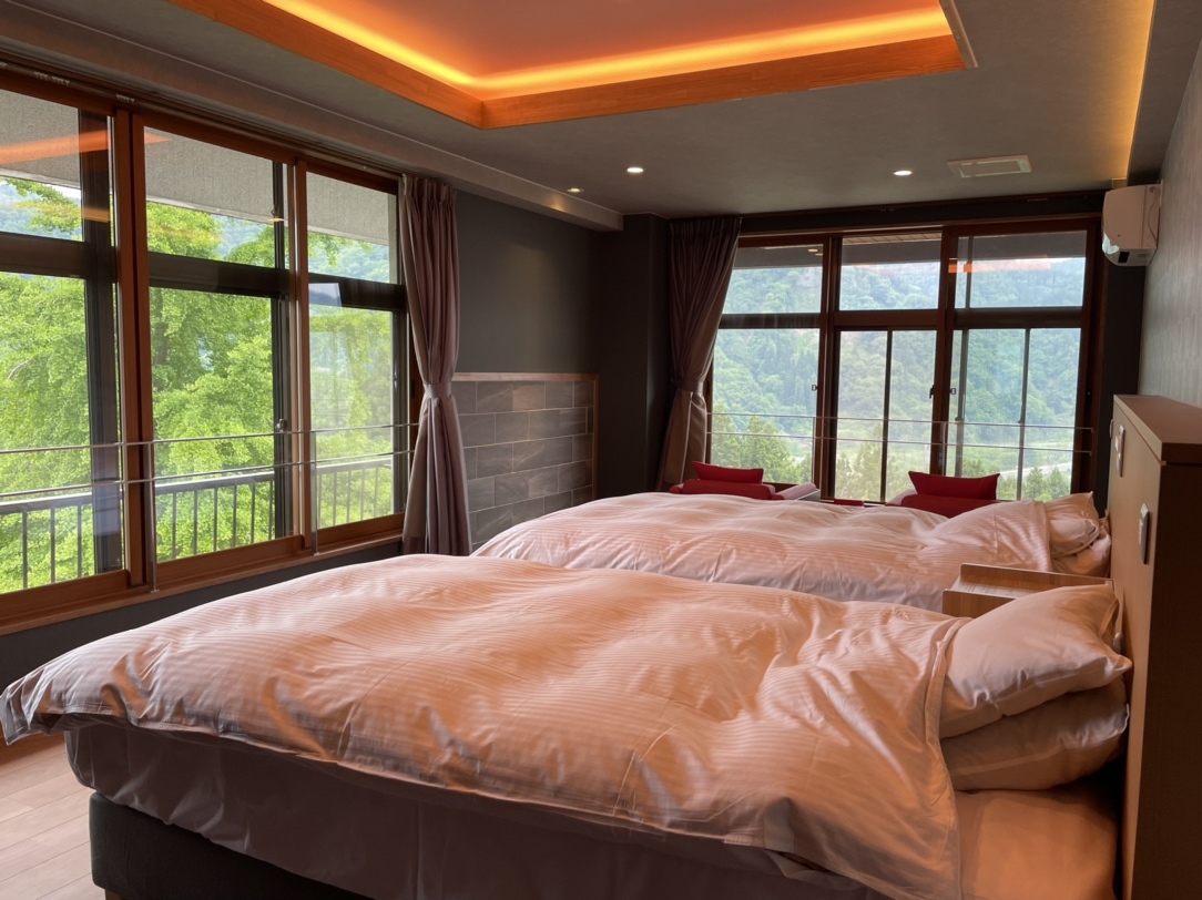 【食事なし】眺望温泉風呂 銀嶺318号室 70平米 洋室セミダブルツイン+和室ソファリビング