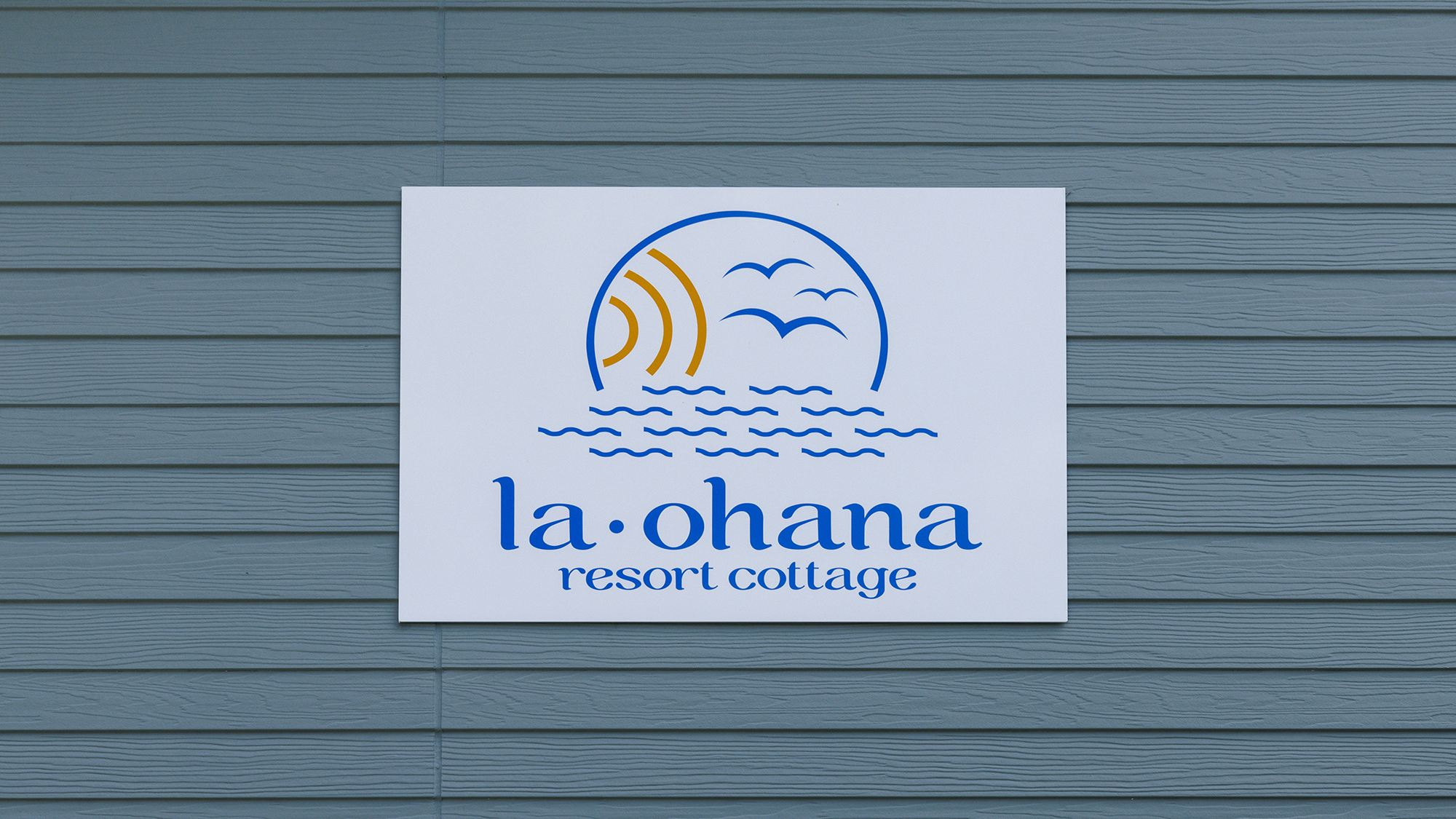 La Ohana ロゴ　ハワイ語で「家族」を意味するOhana。大切なご家族とかけがえのない時間を。