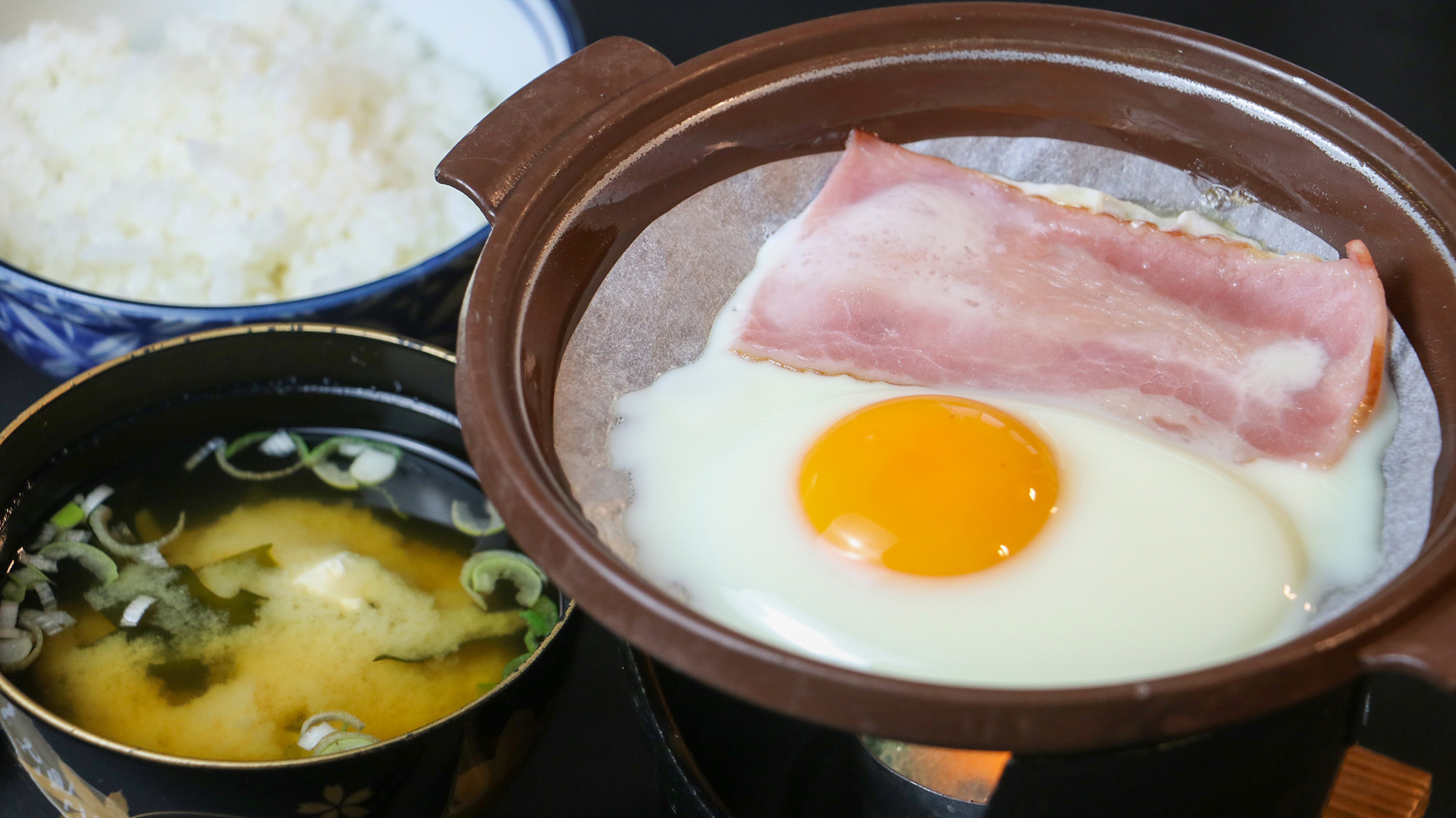 #朝食一例　半熟の卵に山田町産のお醤油をかけてお召し上がりください。