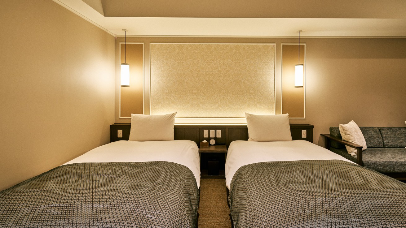 【ツイン】ゆったりとしたセミダブルサイズのベッドで快適なご滞在を。