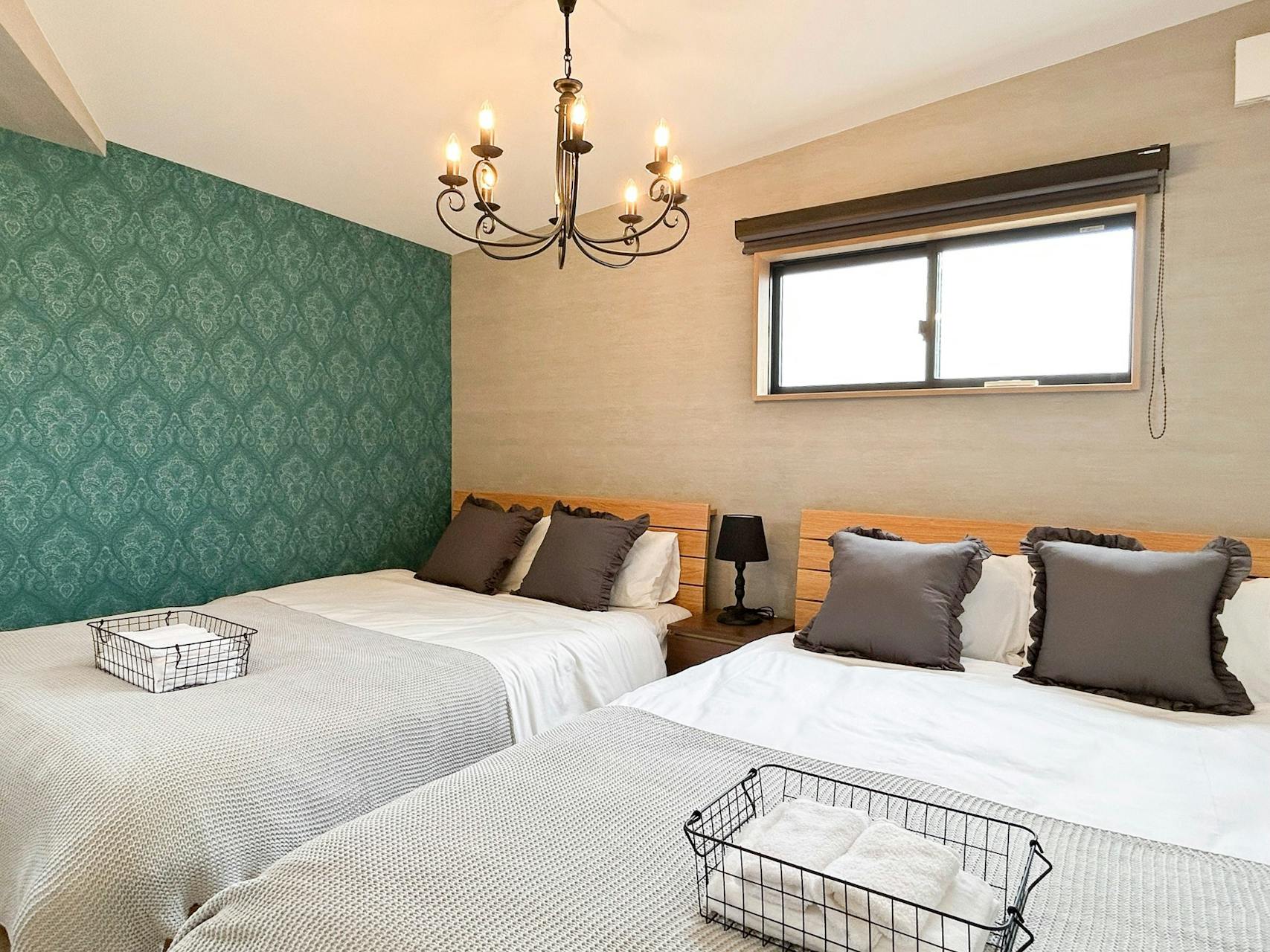 ・【走馬灯B：寝室】ダブルベッドを2台設置しています