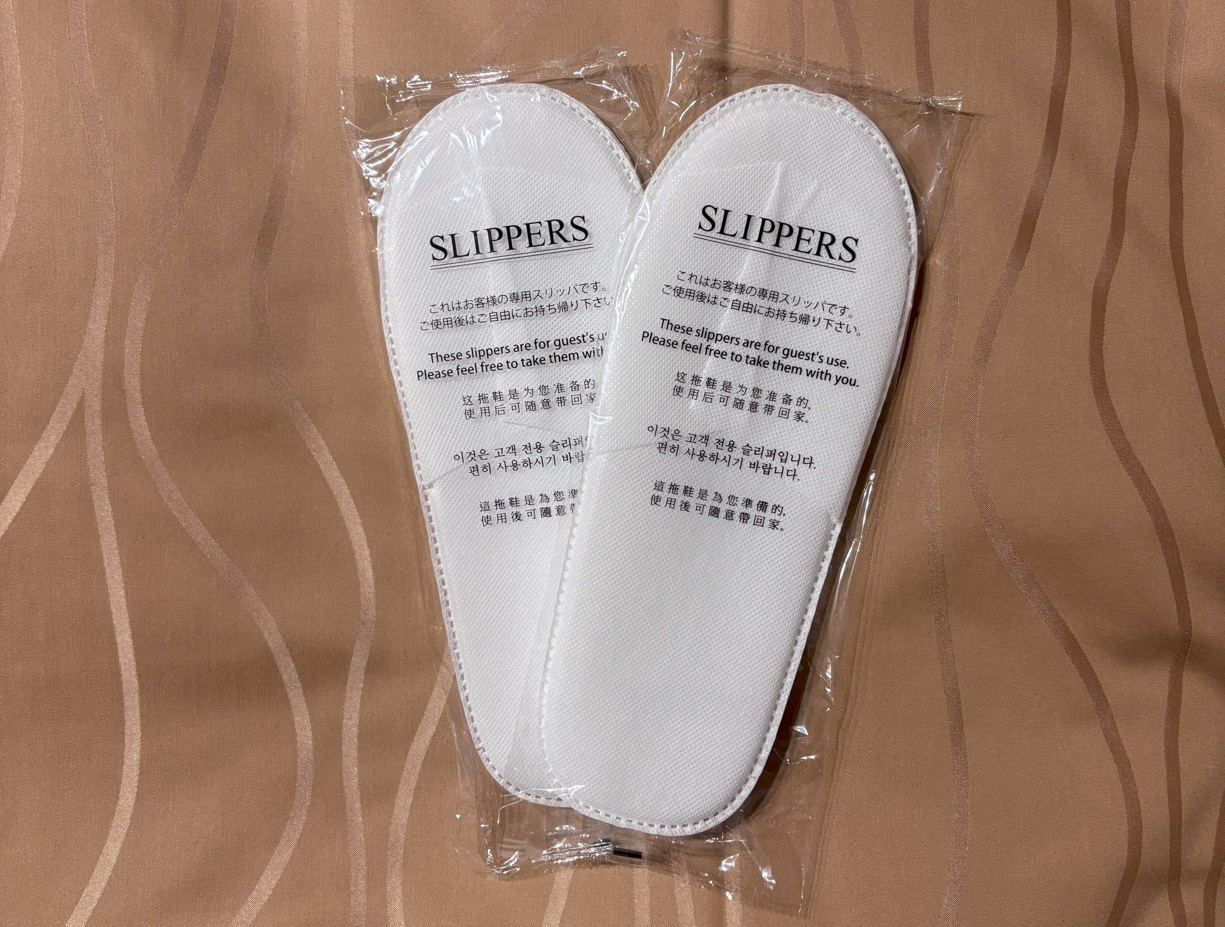 使い捨てスリッパもご用意しております