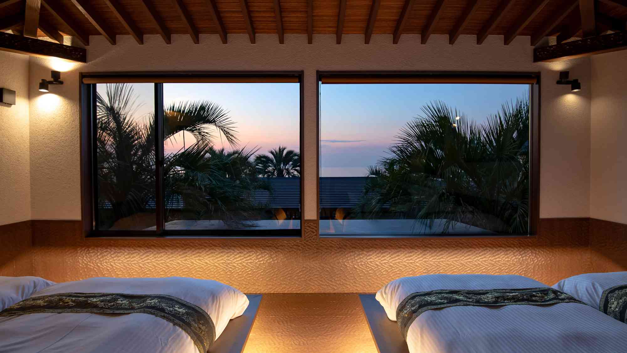 目の前に広がるリゾートガーデンと海