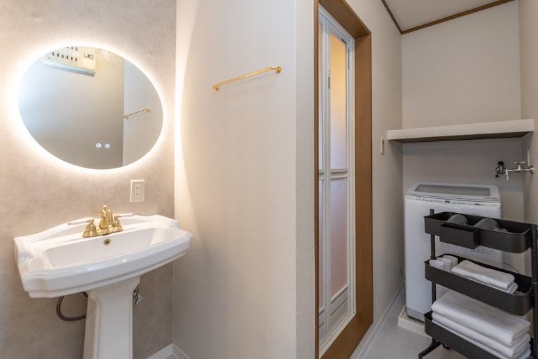 Bathroom: Washing Machine Sink Area Bathtub ...