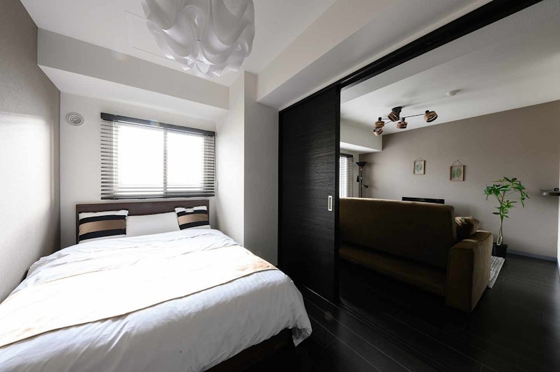 There are two doubled beds in a bedroom!...