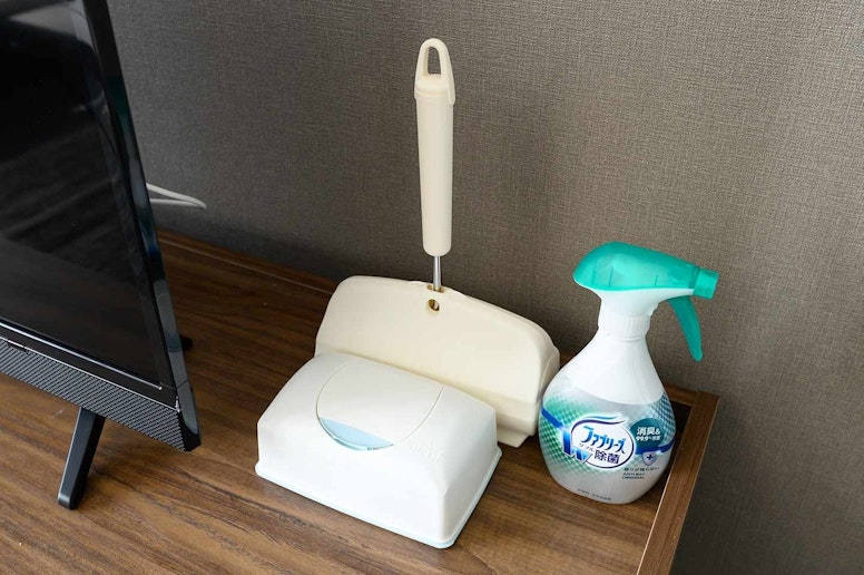 Odor eliminating spray and lint roller and...