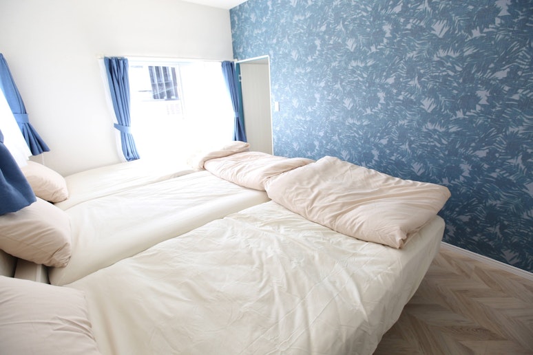 2階の寝室3名部屋　Second-floor bedroom for three guests.
