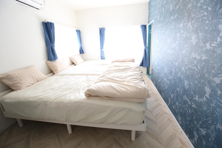 2階の寝室3名部屋　Second-floor bedroom for three guests.