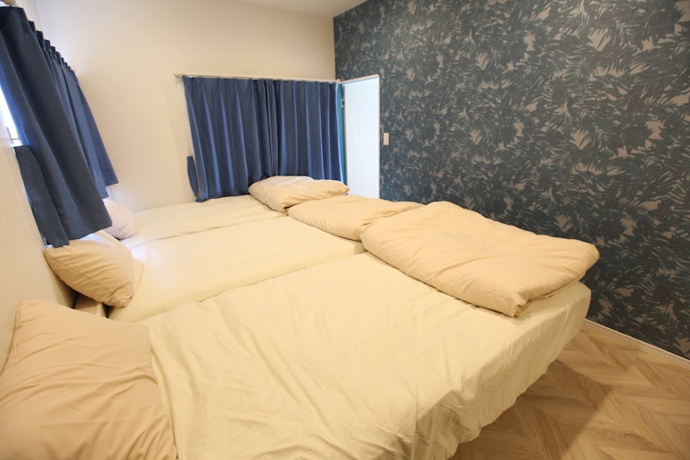 2階の寝室3名部屋　Second-floor bedroom for three guests.