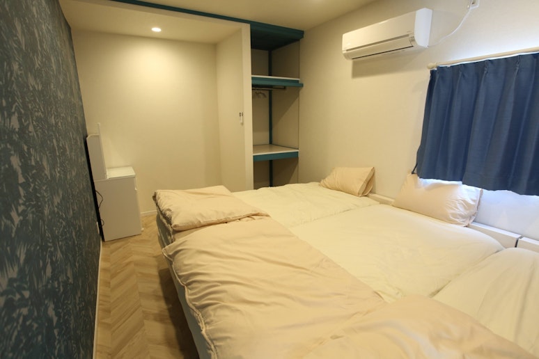 2階の寝室3名部屋　Second-floor bedroom for three guests.