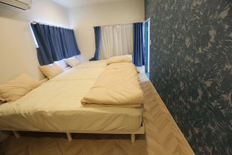 2階の寝室3名部屋　Second-floor bedroom for three guests.