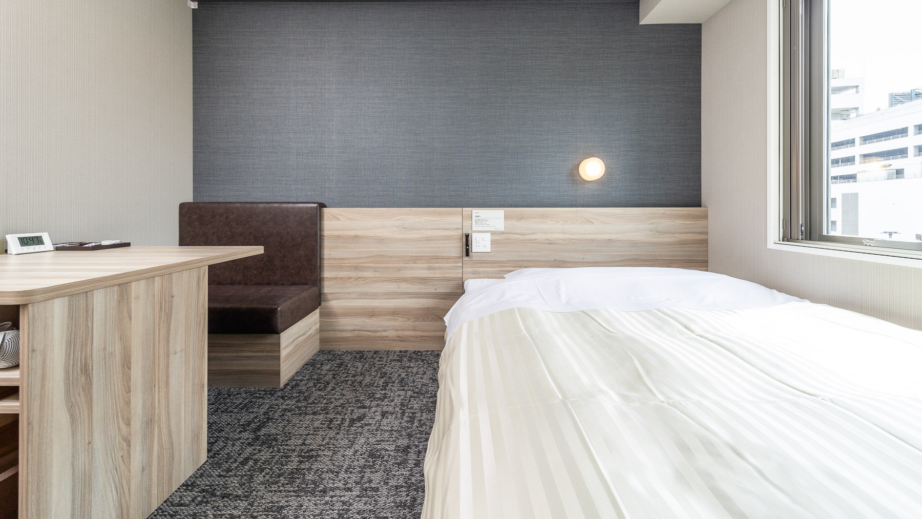 広々としたベッドでごゆっくりおくつろぎ頂けます