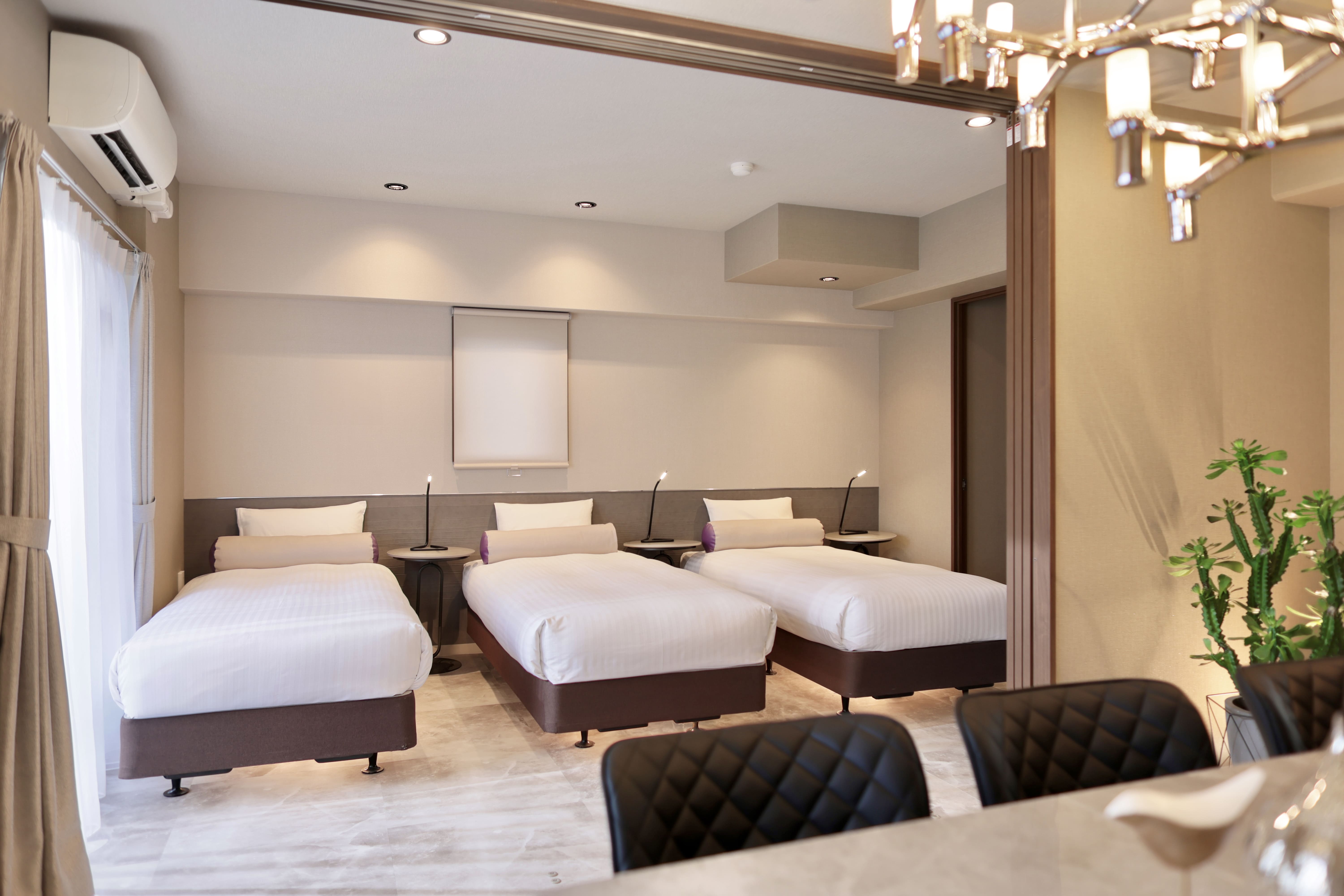 10階スイートルーム（シングルベット3台）