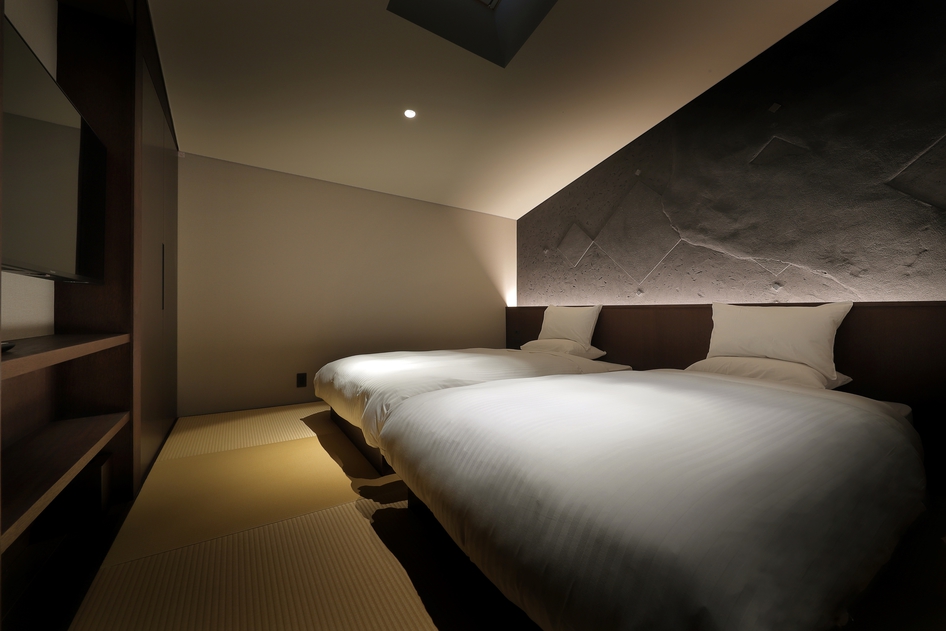 庭園付き露天風呂付客室寝室（一例）