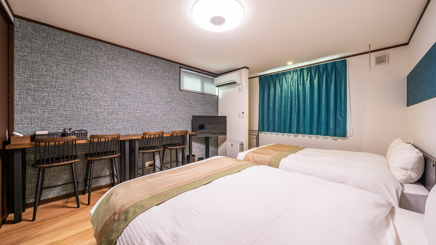 ワイドツインベッドルーム 31㎡：寝室