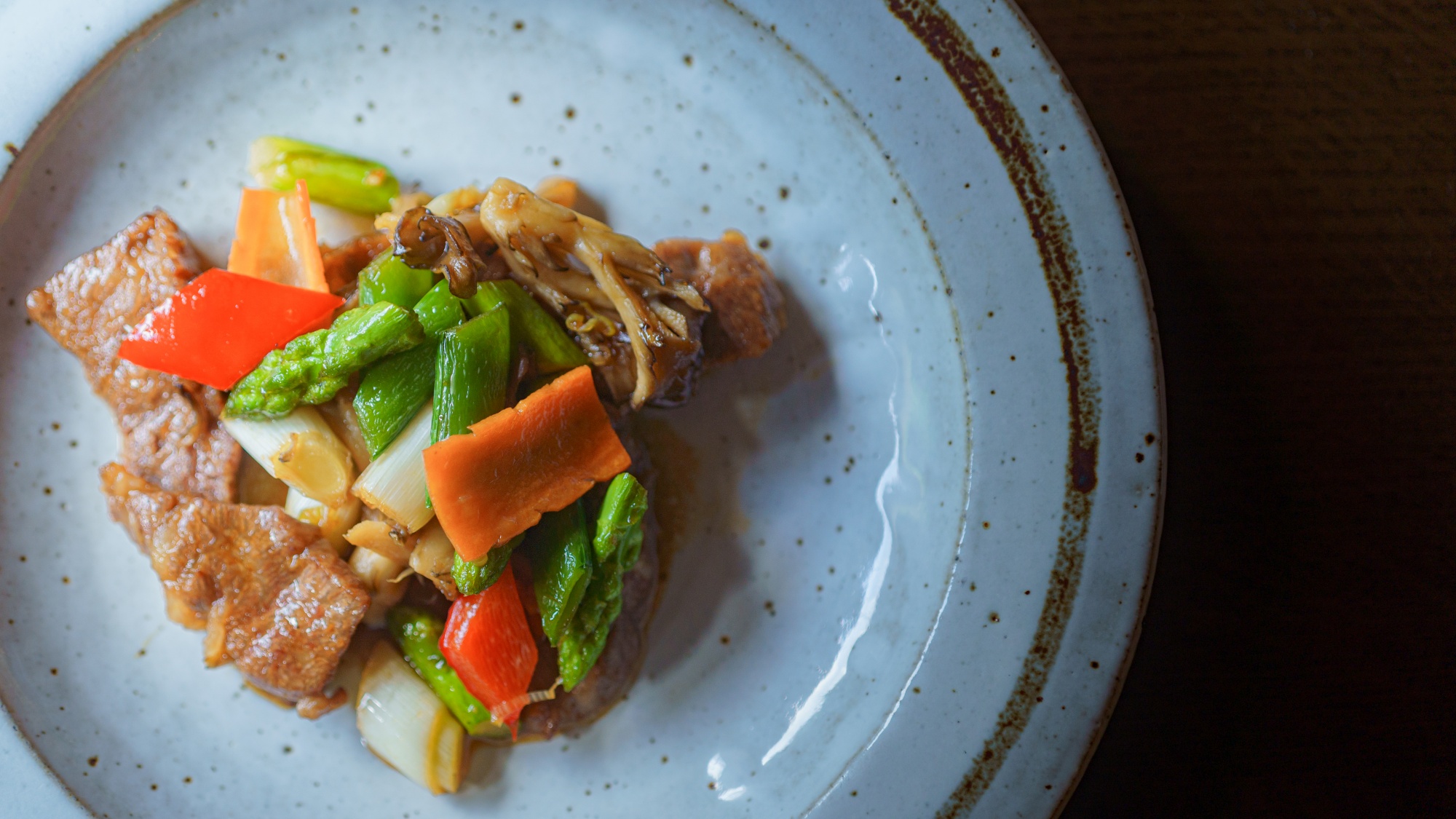 【夕食一例】野菜炒め：地元の新鮮な野菜をぜひ味わってください。
