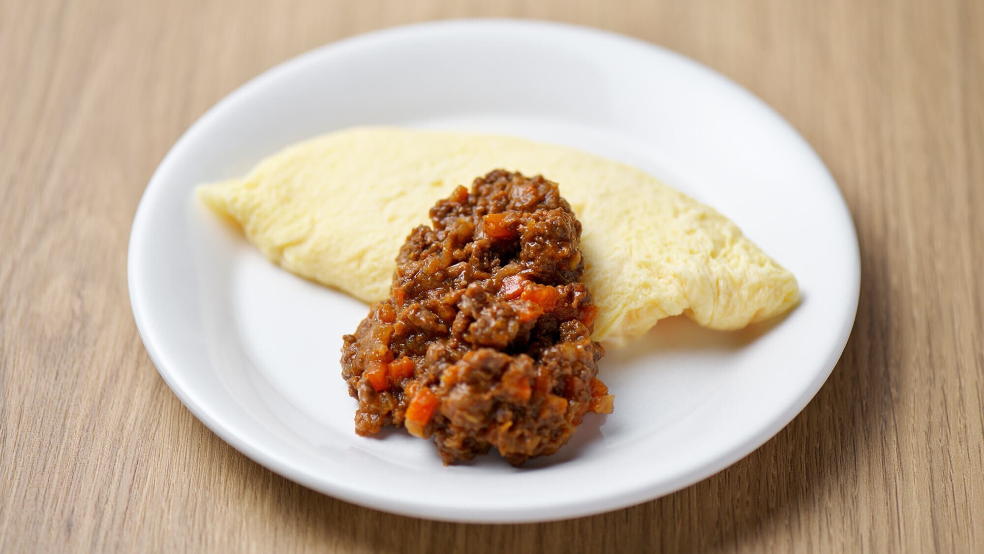 【朝食】シェフの目の前で仕上げるふわとろのオムレツ。焼き立て玉子の美味しさをご賞味ください