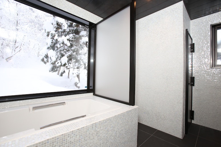 Bathtub and shower space of the master bedroom
