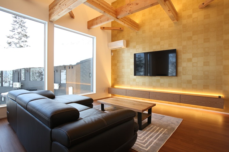 Living room with a large flat smart TV