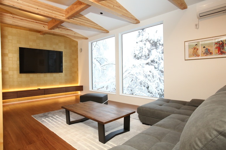 Living room with a large flat smart TV