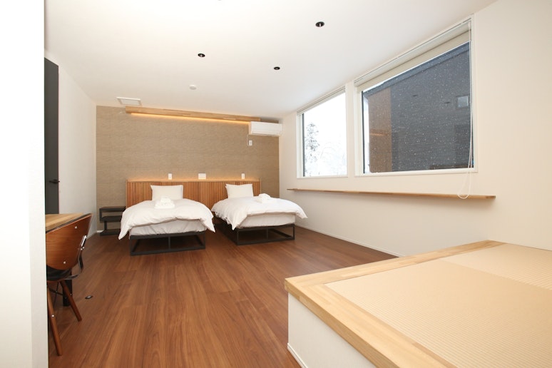 Bedroom 2 (en-suite) with a tatami area and...
