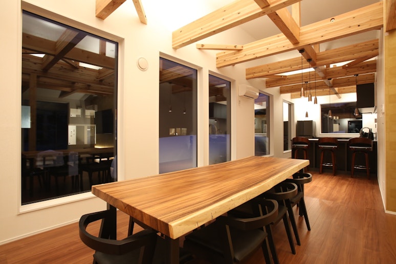 Dining room with a large natural wood dining table