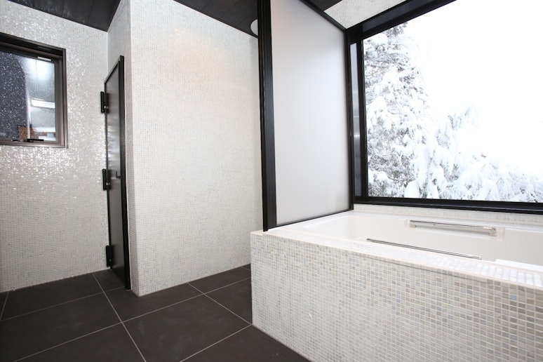 Bathtub and shower space of the master bedroom