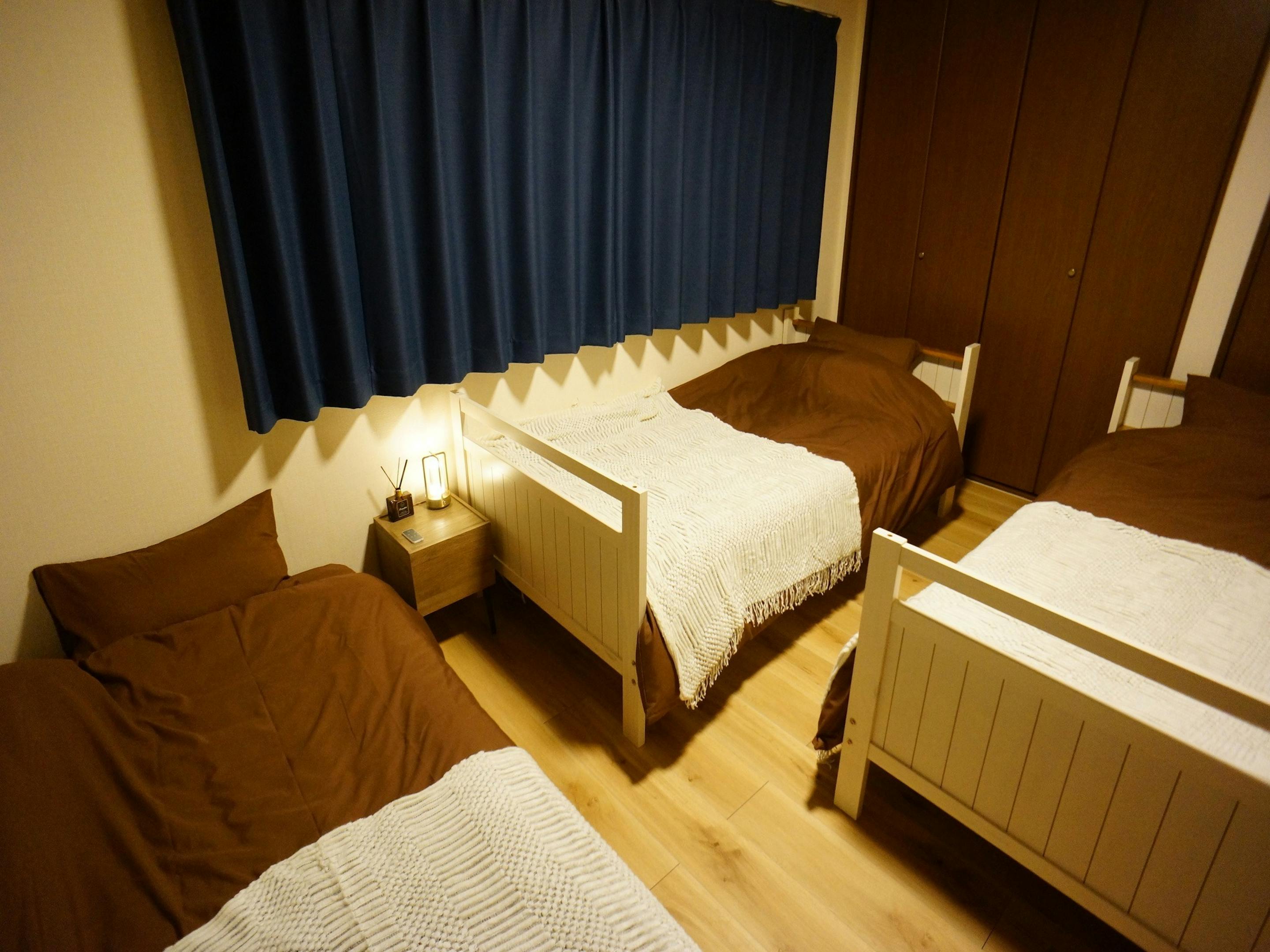 ベットルーム２（シングルベット２台、エクストラベット１台）