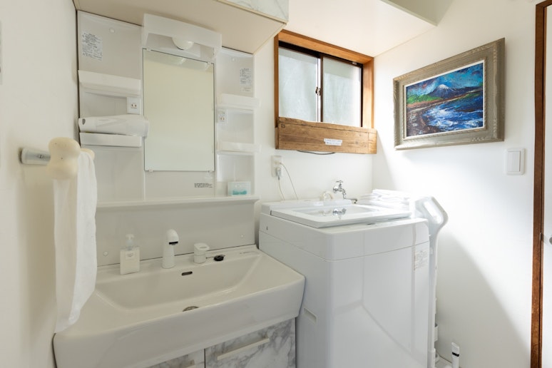 長期滞在中にも便利なランドリールームを完備。