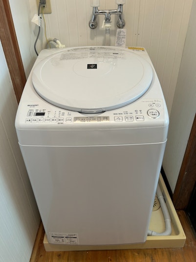 連泊のお客様の為に洗濯乾燥機を完備