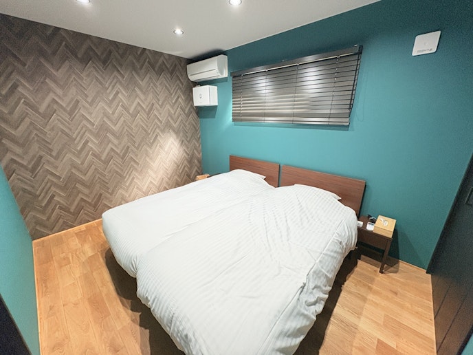 寝室は落ち着いたデザインにしました。快適な睡眠を...