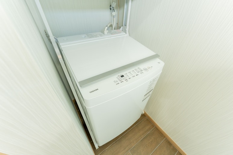 洗濯機・乾燥機も完備し、長期滞在にも便利です。