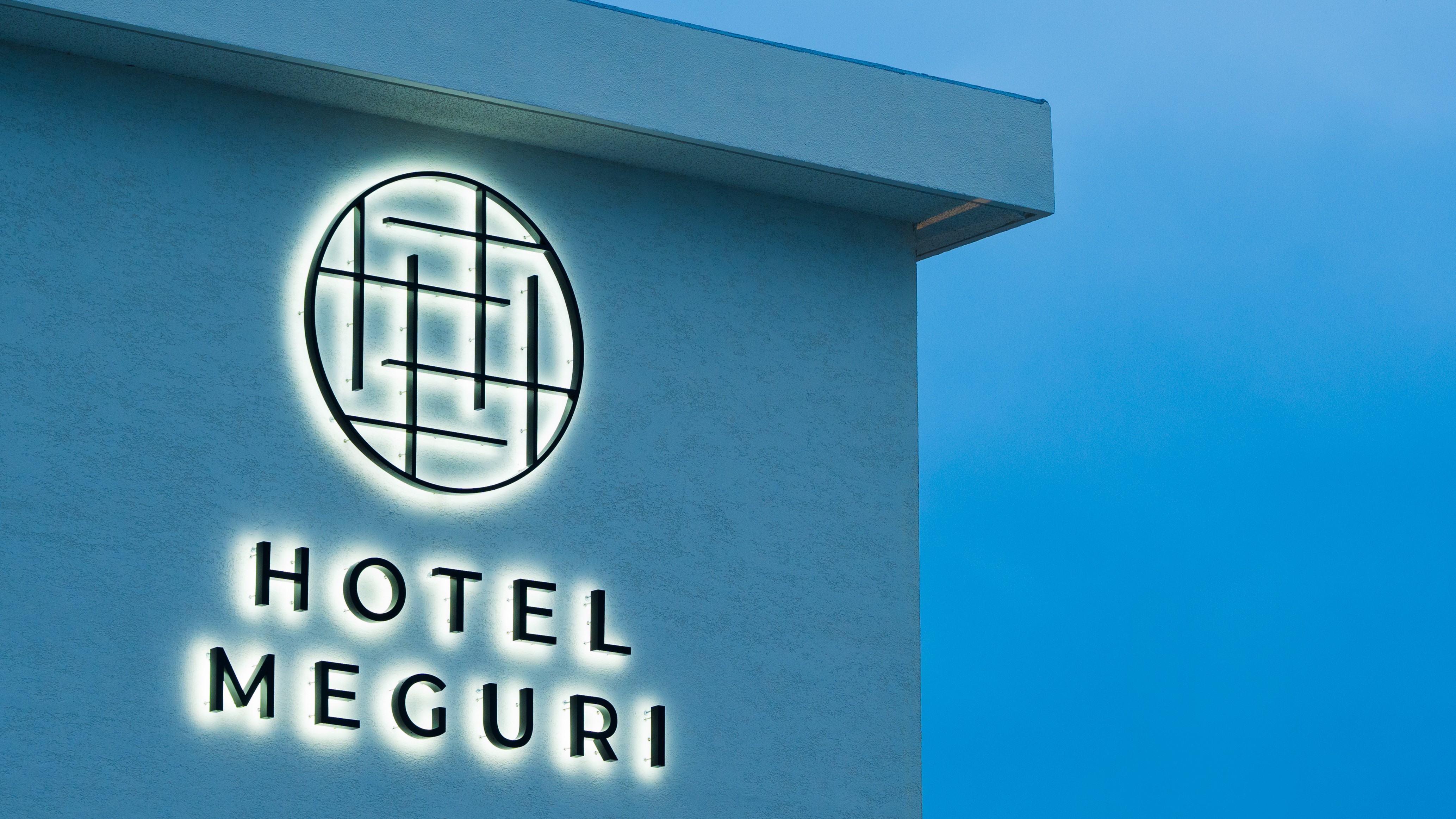 地域と人々のつながりを象徴するロゴイメージ