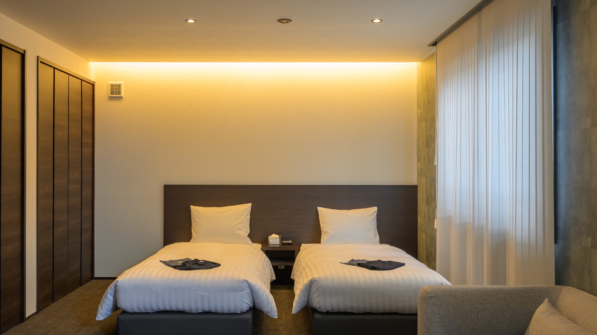 【客室】グランドツイン。ゆったり休めるシングルベッド2台設置。