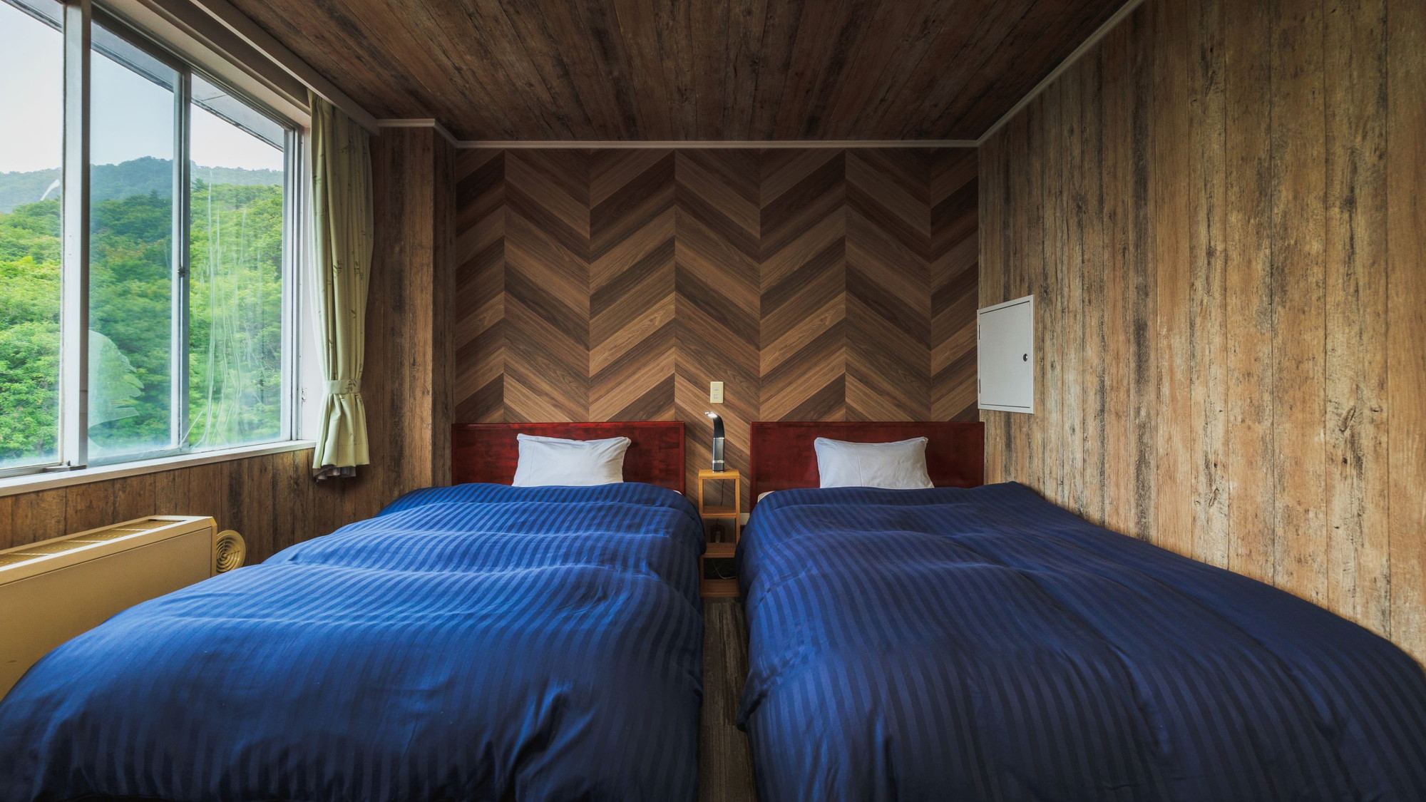 【スタンダードツイン】リゾートの雰囲気を満喫できる、スタンダードタイプの洋室です。