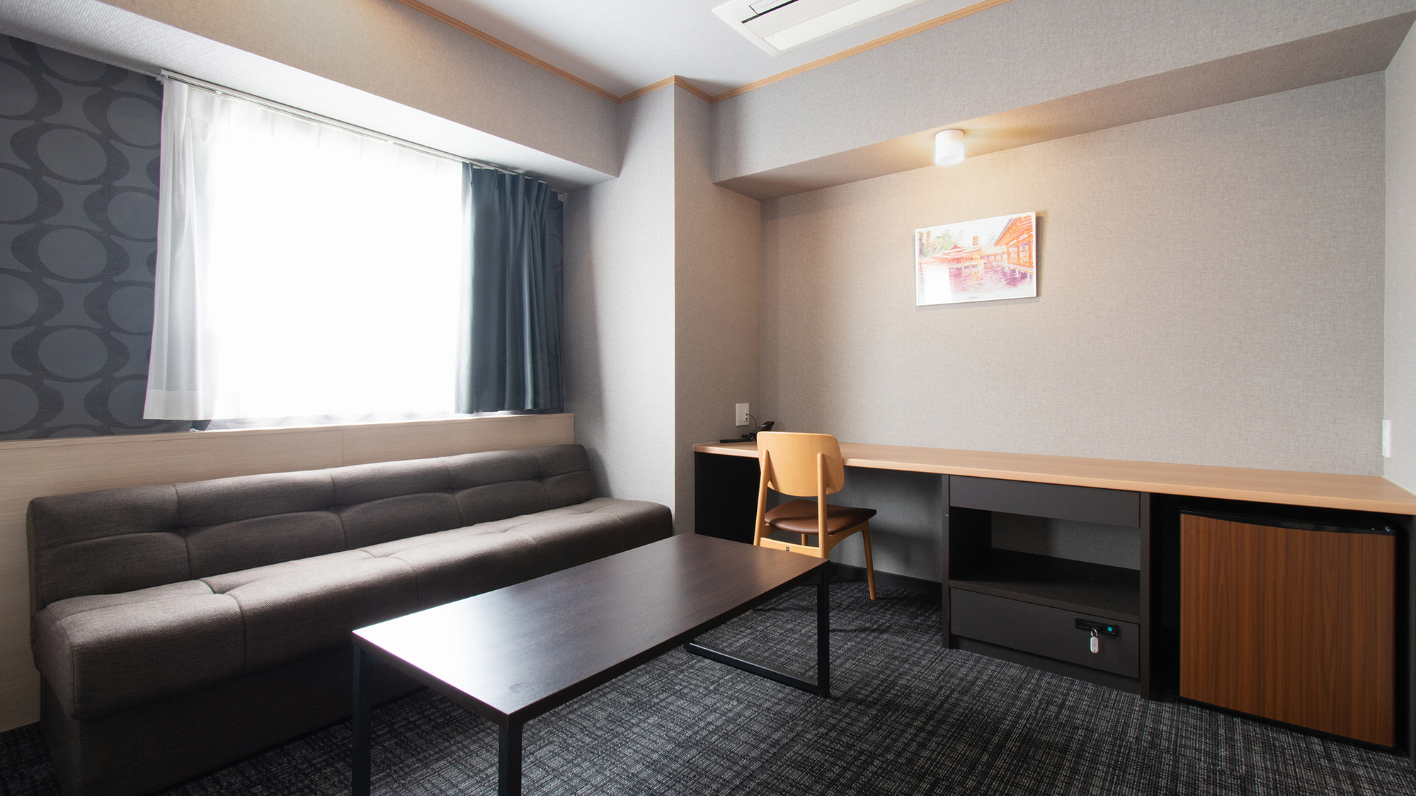 ①デラックスルーム（洋室）