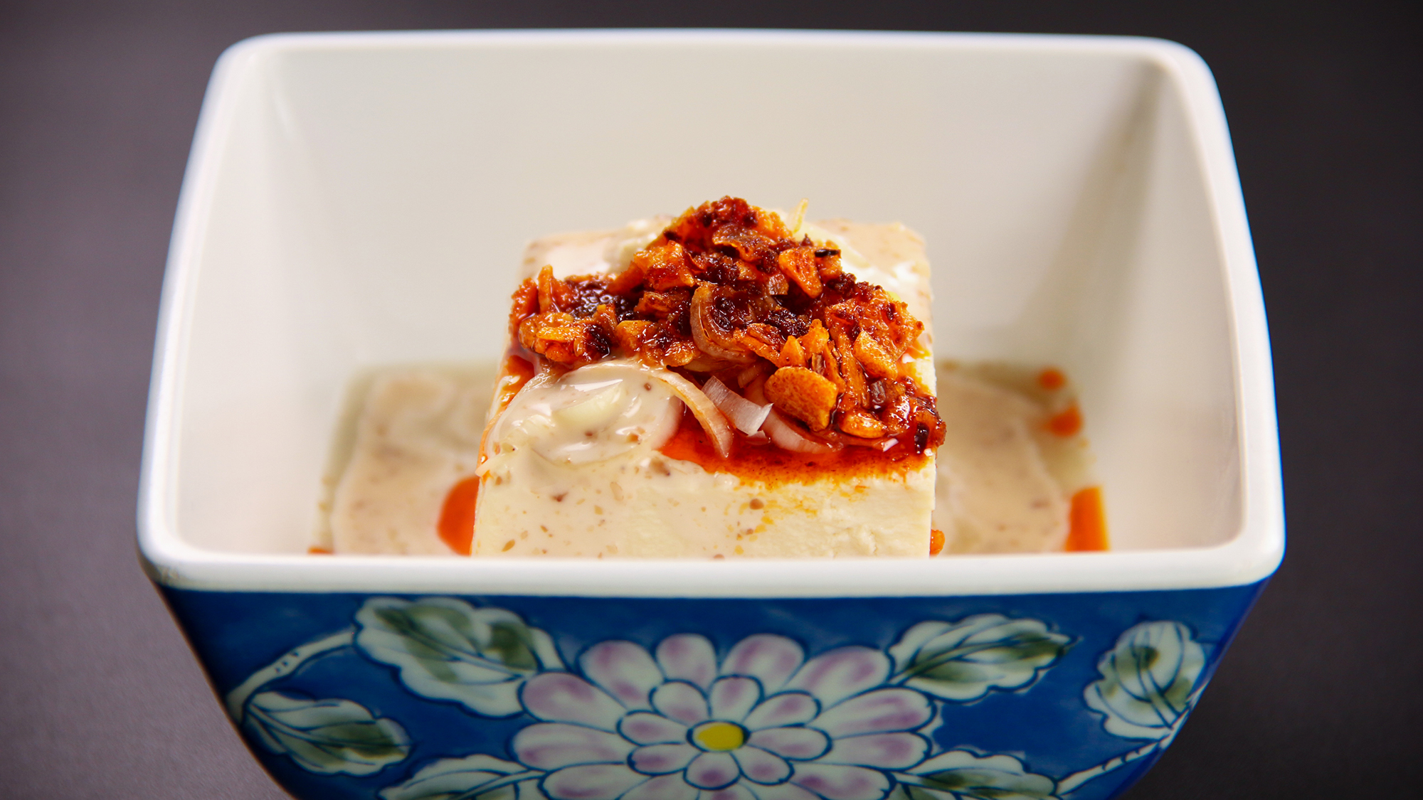 #夕食　ピリ辛の食べるラー油と濃厚なゴマだれが絡むオリジナル冷奴です