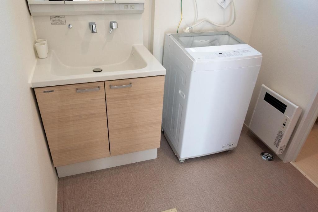 【素泊まり】ファミリー向け3LDKで最大9名/スキー場まで車で15分/旭川駅まで車で8分/無料駐車場