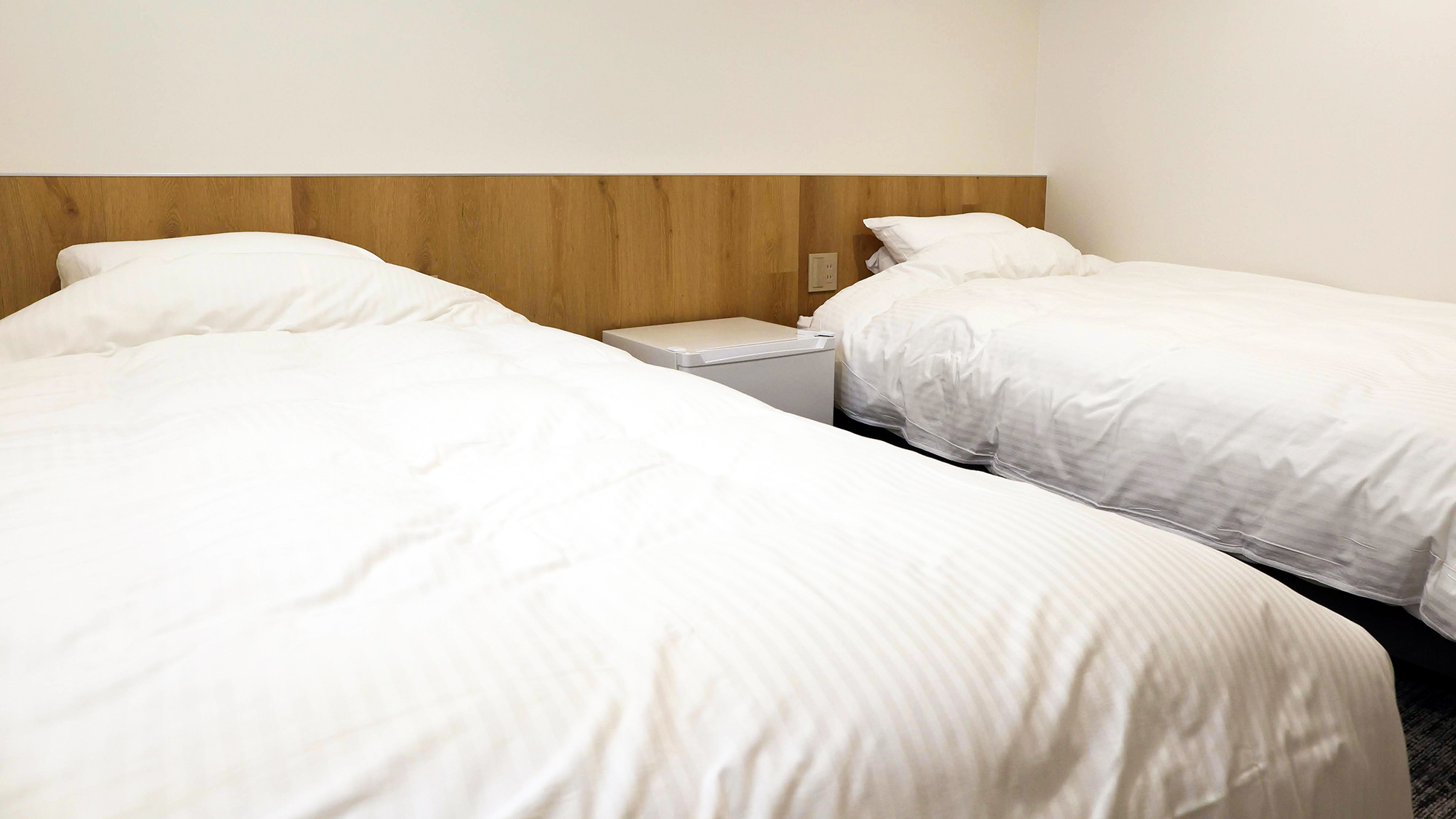 ・【ツインルーム】ご友人との旅行にもぴったりなお部屋。しっかりとスペースを確保してお休みいただけます