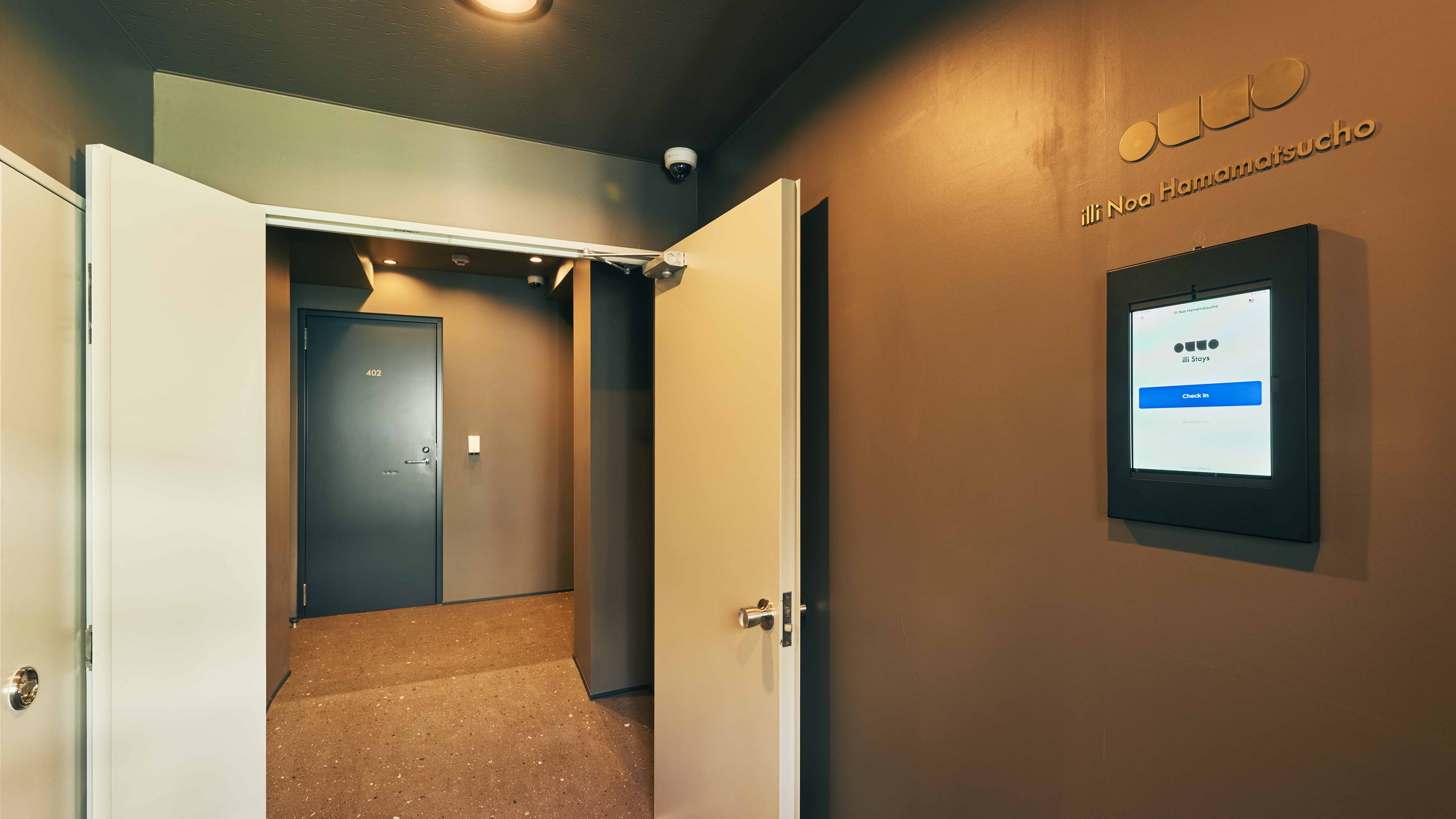 4階チェックインタブレット