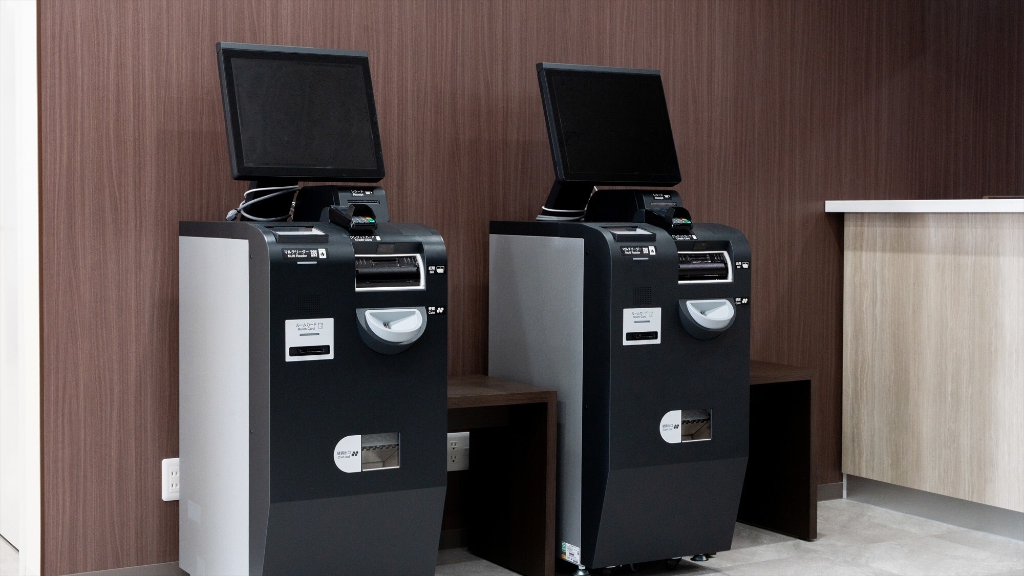 自動チェックアウト精算機