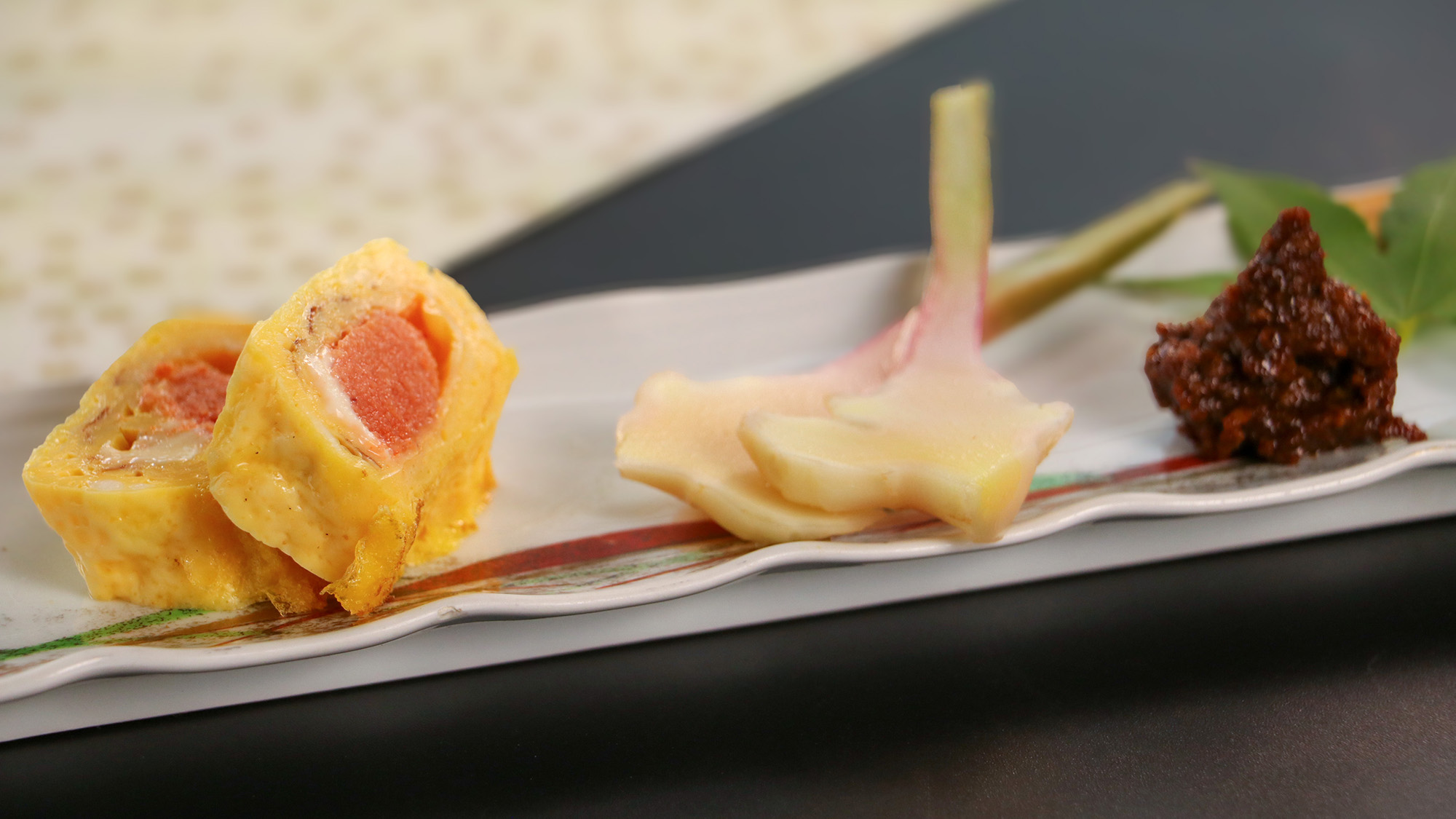 #夕食　旅の食卓を彩る一品。明太子の旨みと卵のやさしい味わいが楽しめる前菜。