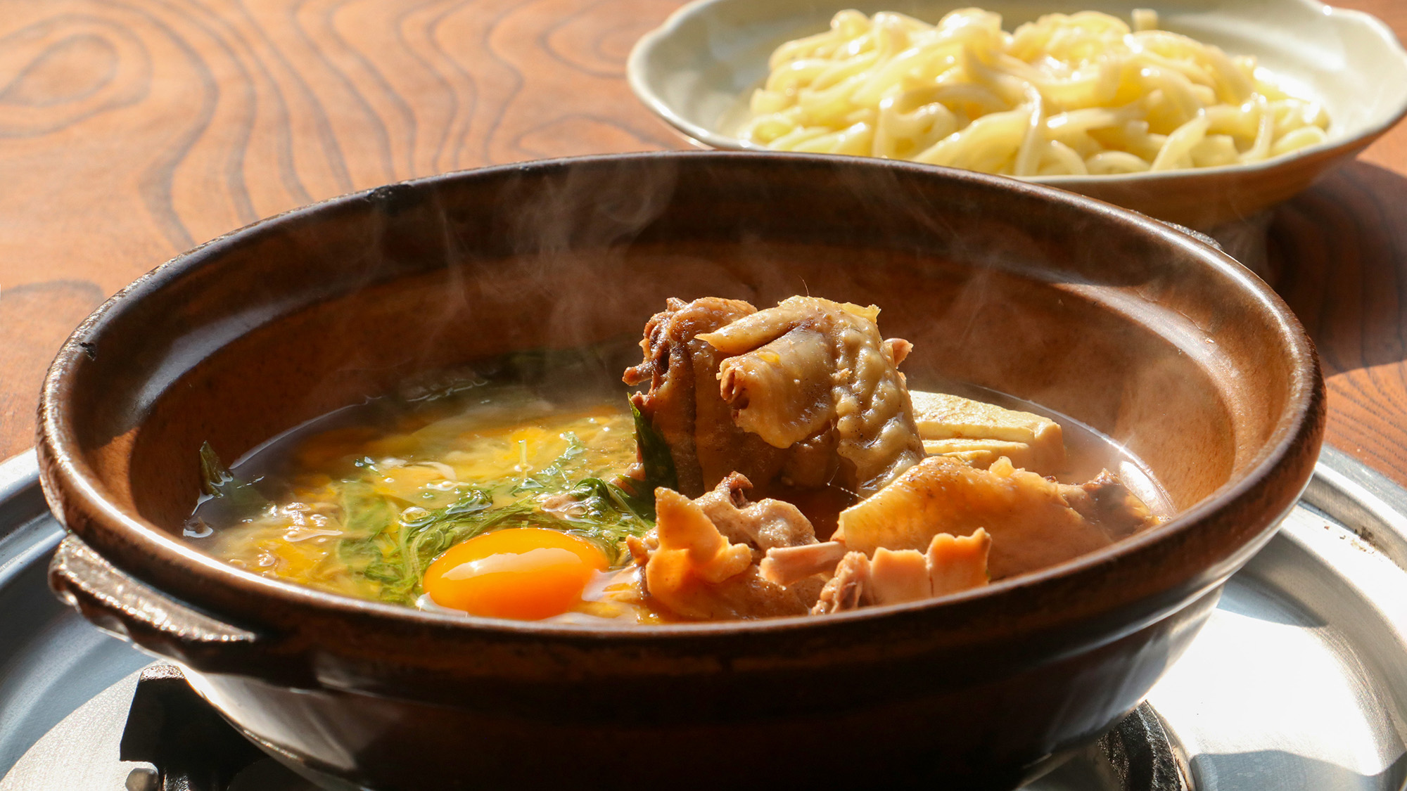 #奥久慈しゃも鍋　奥久慈しゃもの旨味と、貴重なしゃもの卵がそろった贅沢の一品。