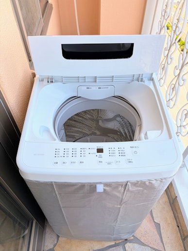 洗濯用洗剤は洗面所にご用意しております。