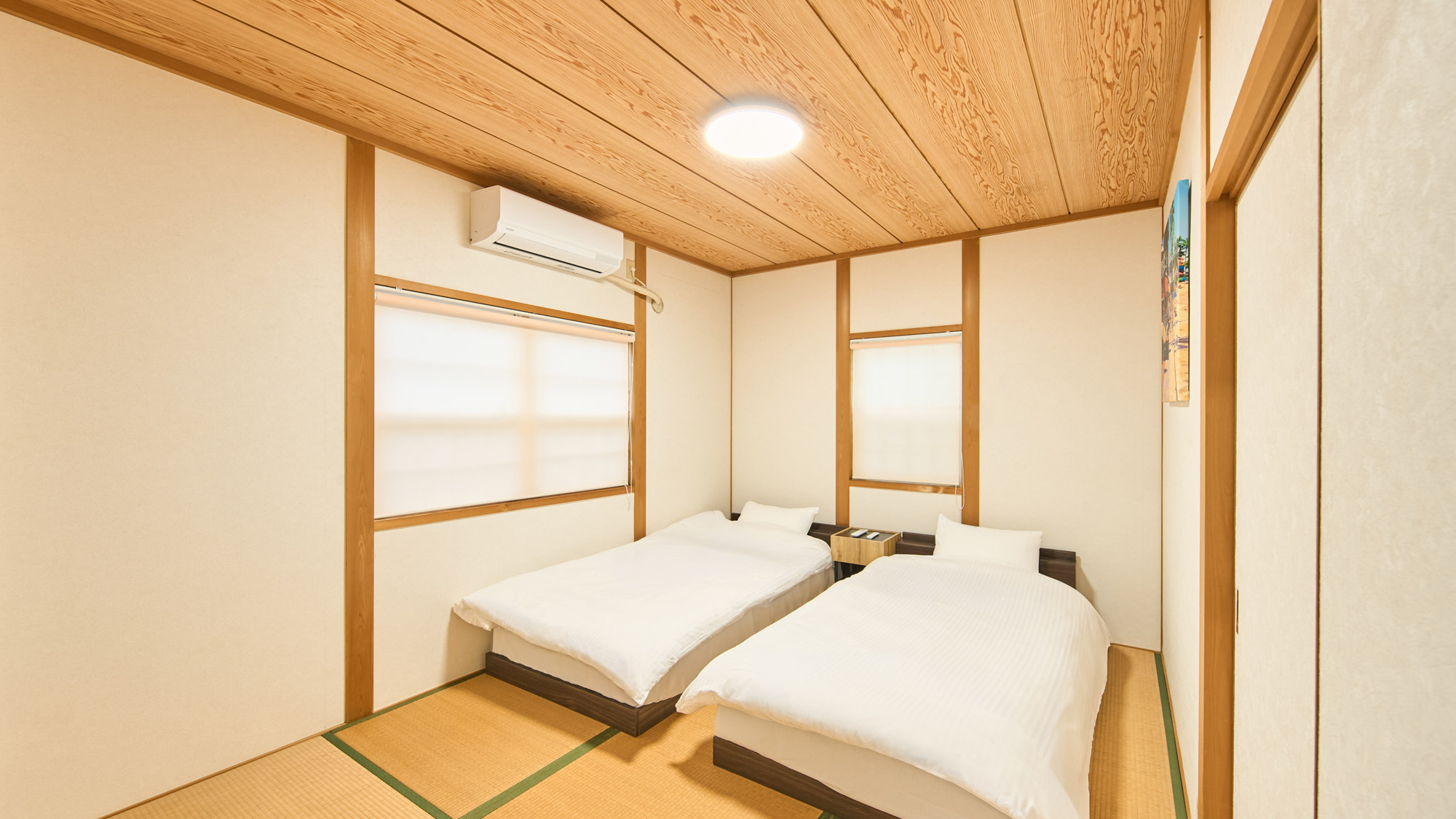 寝室：シングルベッド2台