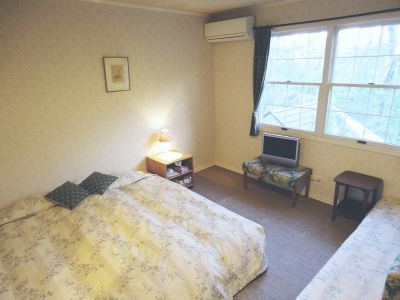 Western-style twin room - triple room (child-friendly)
