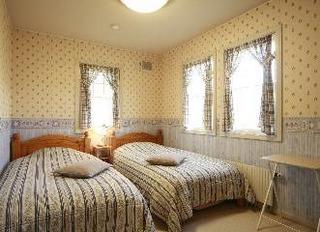 ツインベッドルーム　洋室のお部屋